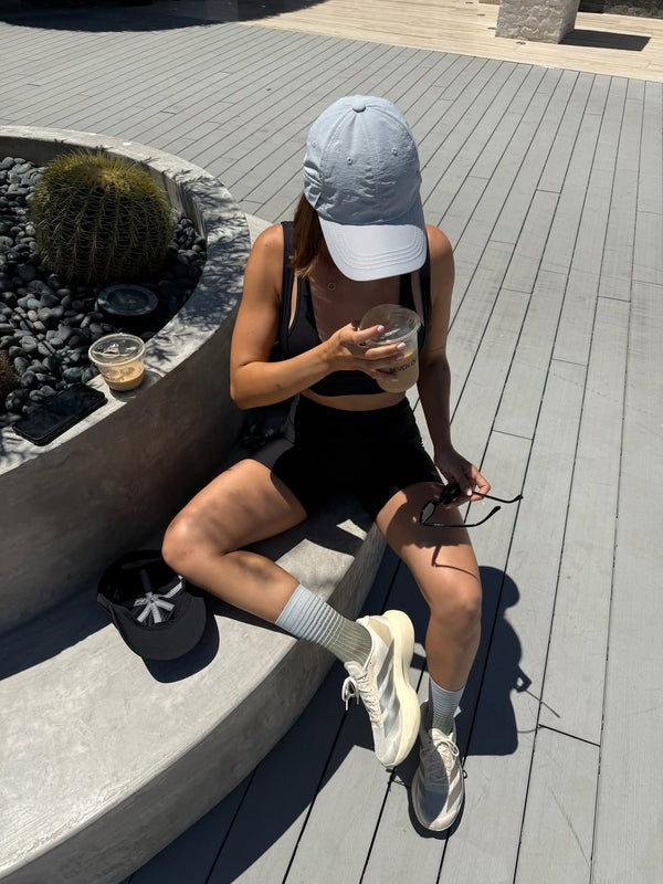 @aderlycg wearing URH OPT Washed Cap