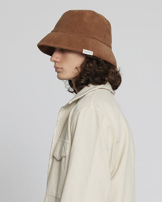 Short visor safari hat providing warmth and comfort