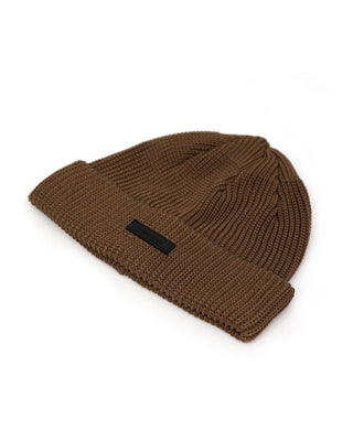 Model wearing a short beanie in winter