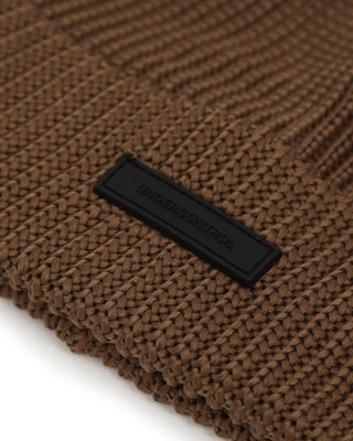 Collection of colorful beanies on display