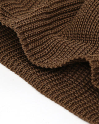 Short beanie in a cozy indoor setting