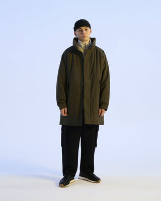 Brimless cap with an embroidered logo