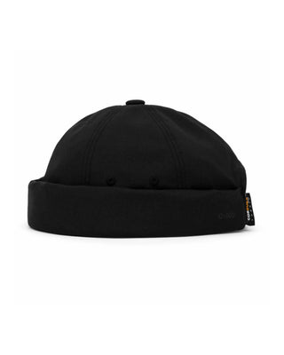 Person wearing a skull cap while cycling