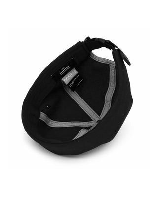 Watch cap in a cityscape setting