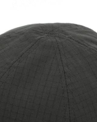Adjustable ball cap showcasing the strap