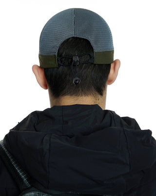 Exploring outdoors with a short visor cap