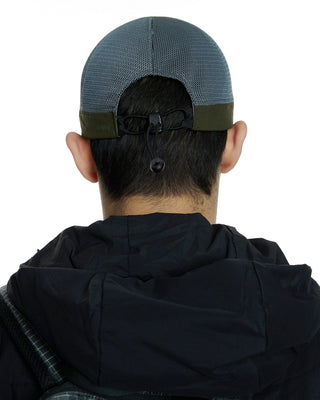 Exploring outdoors with a short visor cap