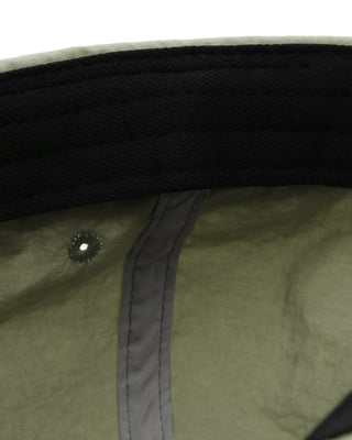 Sun-protective cap worn during hiking