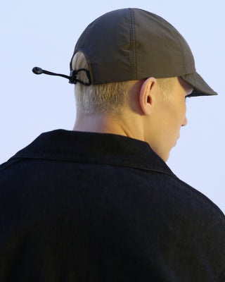Baseball cap with short visor on a picnic