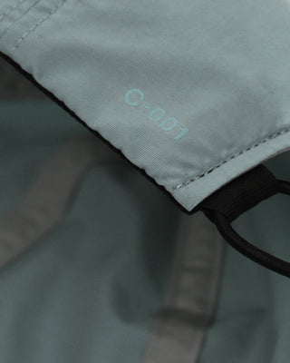 Sun-protective cap worn during hiking