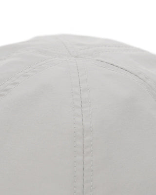 Baseball cap with short visor on a picnic