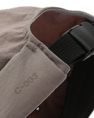 Person wearing a skull cap while cycling