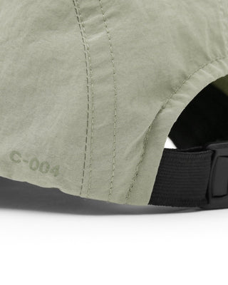 Collection of camp caps in various colors and designs.