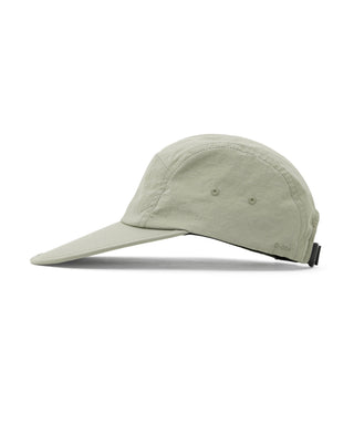 Flat visor cap highlighting its sun protection feature.