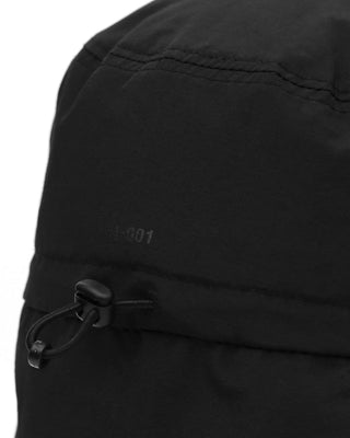Foldable visor neatly packed in a travel bag, showcasing its portability.