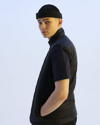 Watch cap in a cityscape setting