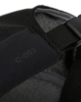 Person wearing a skull cap while cycling