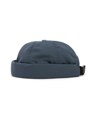 Adjustable brimless cap on a mountain peak