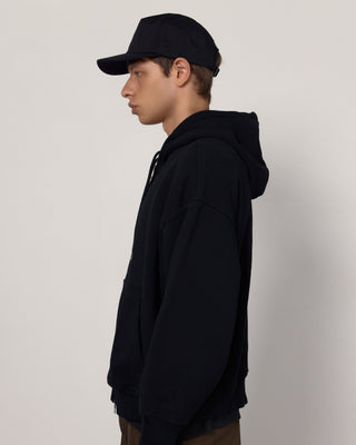 Ball cap featuring a unique logo design.