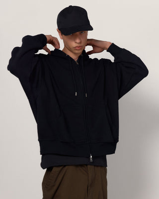 Collection of caps in different styles and colors.