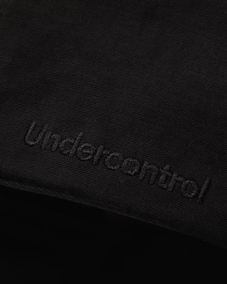 Sun protection cap showcased in a sunny setting.