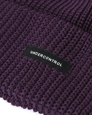 Summer outfit paired with UNDERCONTROL beanie