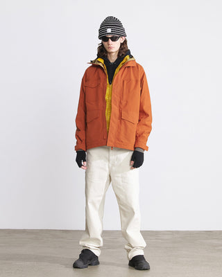 Fingerless gloves paired with a winter outfit