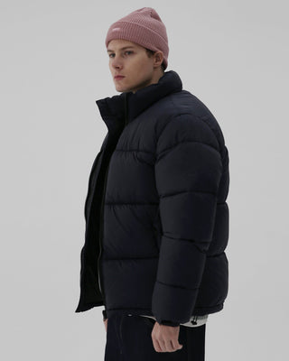 A model wearing a fisherman beanie