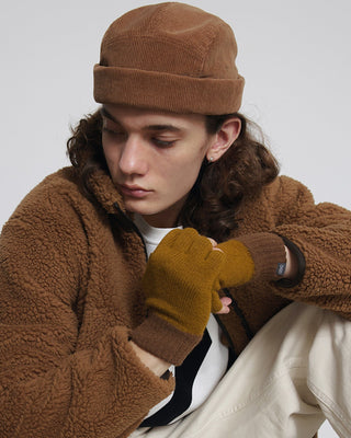 Variety of winter gloves in a retail display