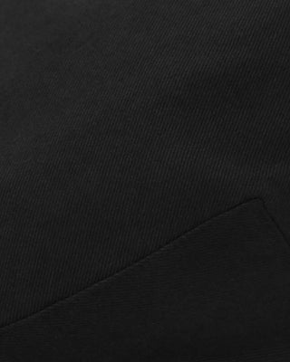 Black hunting cap styled with casual outfit