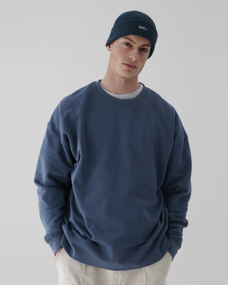 Assorted beanies in neutral tones