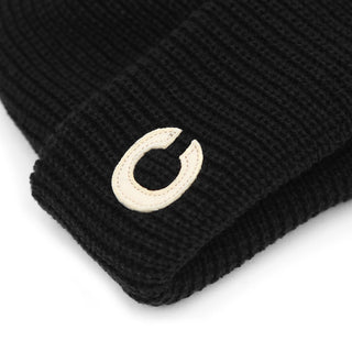 Collection of colorful beanies on display