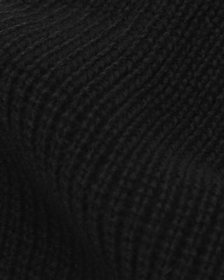 Short beanie in a cozy indoor setting