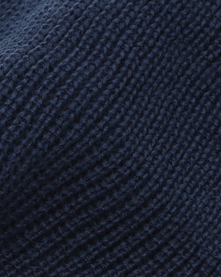 Short beanie in a cozy indoor setting