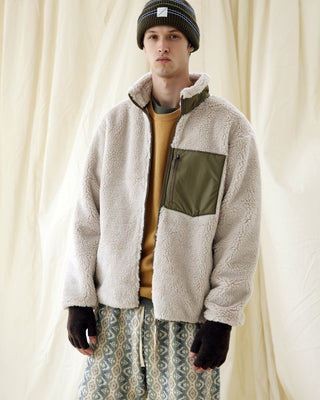 Warm winter gloves in a cozy indoor environment