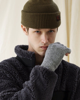 Stylish fingerless gloves in a casual outdoor setting