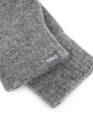 Warm winter gloves in a cozy indoor environment