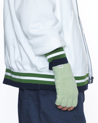 Touchscreen handwarmers in use with a smartphone