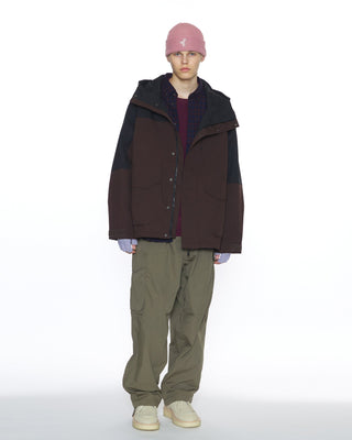 Fingerless gloves paired with a winter outfit