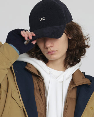 Stylish fingerless gloves in a casual outdoor setting