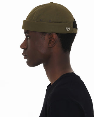 Brimless cap in various colors and styles.