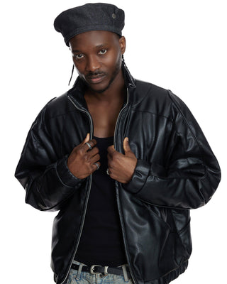 A fashionable newsboy cap with a plaid pattern.