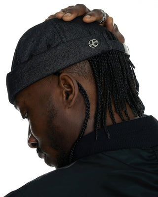 Classic brimless cap design.