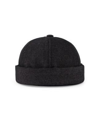 Minimalist brimless cap for a sleek look.