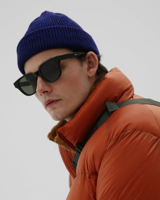 Short beanie in a cozy indoor setting