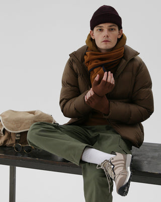 Short beanie in a cozy indoor setting