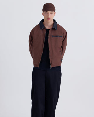 UC mold cap in black and brown colorways