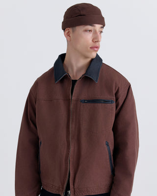 Brimless faded black cap front view