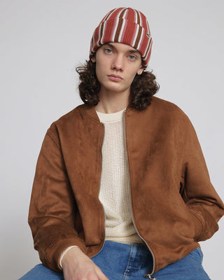 Group of friends wearing different beanie styles