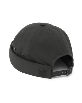 Brimless cap in a natural outdoor setting